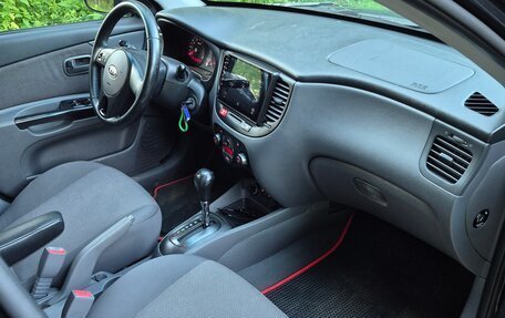 KIA Rio II, 2011 год, 570 000 рублей, 11 фотография