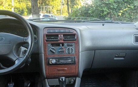 Toyota Avensis III рестайлинг, 1998 год, 300 000 рублей, 16 фотография