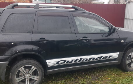 Mitsubishi Outlander III рестайлинг 3, 2007 год, 690 000 рублей, 13 фотография