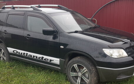 Mitsubishi Outlander III рестайлинг 3, 2007 год, 690 000 рублей, 11 фотография