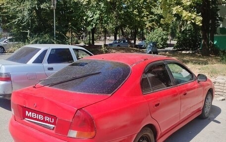 Mitsubishi Carisma I, 1997 год, 130 000 рублей, 3 фотография