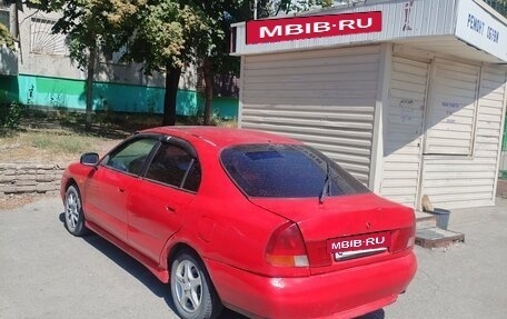 Mitsubishi Carisma I, 1997 год, 130 000 рублей, 4 фотография