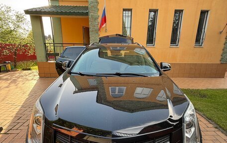Cadillac SRX II рестайлинг, 2012 год, 1 400 000 рублей, 18 фотография