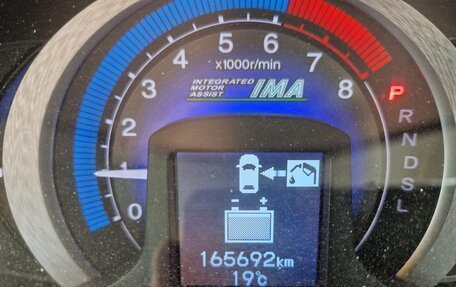 Honda Insight II рестайлинг, 2009 год, 750 000 рублей, 8 фотография