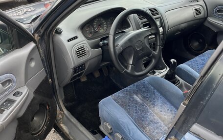 Mazda 323, 1998 год, 270 000 рублей, 9 фотография