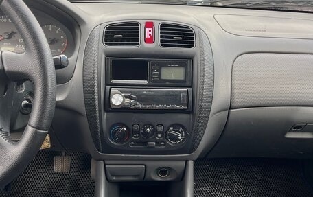Mazda 323, 1998 год, 270 000 рублей, 10 фотография