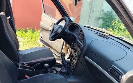 Chevrolet Niva I рестайлинг, 2012 год, 290 000 рублей, 4 фотография