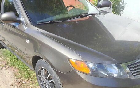 KIA Magentis II рестайлинг, 2010 год, 650 000 рублей, 10 фотография