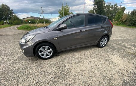 Hyundai Solaris II рестайлинг, 2012 год, 700 000 рублей, 2 фотография