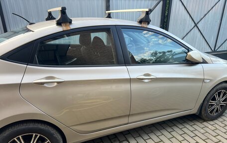 Hyundai Solaris II рестайлинг, 2011 год, 750 000 рублей, 10 фотография