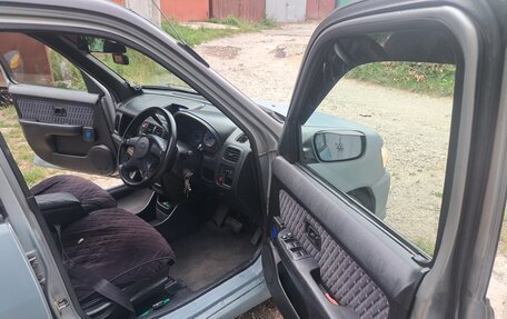 Nissan Cube II, 1999 год, 235 000 рублей, 24 фотография