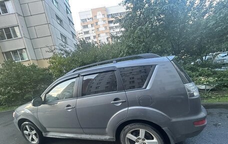 Mitsubishi Outlander III рестайлинг 3, 2011 год, 900 000 рублей, 4 фотография