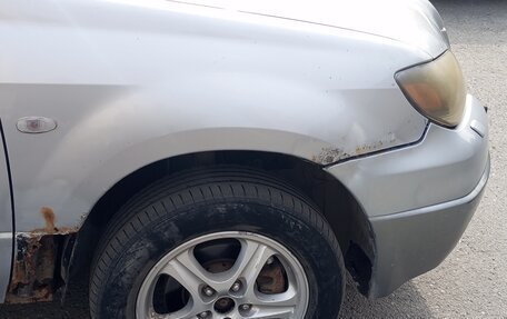Mitsubishi Outlander III рестайлинг 3, 2004 год, 700 000 рублей, 3 фотография