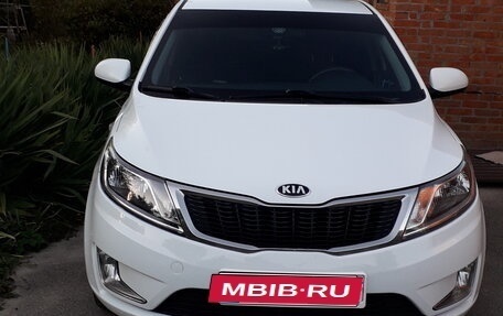 KIA Rio III рестайлинг, 2013 год, 1 050 000 рублей, 26 фотография
