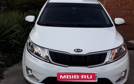 KIA Rio III рестайлинг, 2013 год, 1 050 000 рублей, 24 фотография