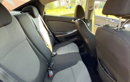 Hyundai Solaris II рестайлинг, 2011 год, 680 000 рублей, 21 фотография