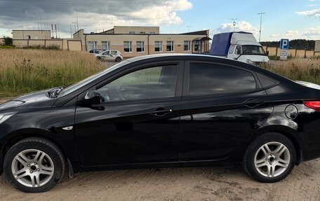 Hyundai Solaris II рестайлинг, 2011 год, 830 000 рублей, 15 фотография