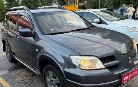 Mitsubishi Outlander III рестайлинг 3, 2006 год, 670 000 рублей, 3 фотография