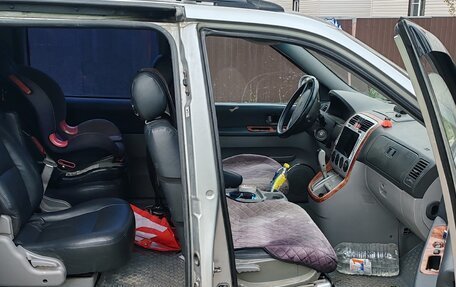 KIA Carnival III, 2004 год, 380 000 рублей, 2 фотография