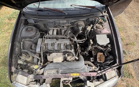 Mazda 626, 1994 год, 150 000 рублей, 31 фотография