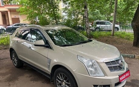 Cadillac SRX II рестайлинг, 2011 год, 1 000 000 рублей, 13 фотография