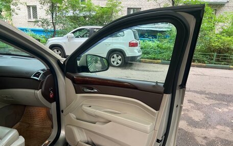 Cadillac SRX II рестайлинг, 2011 год, 1 000 000 рублей, 18 фотография
