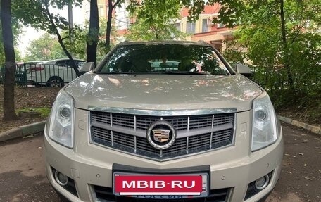 Cadillac SRX II рестайлинг, 2011 год, 1 000 000 рублей, 17 фотография