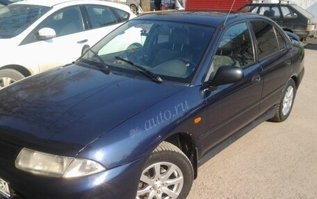 Mitsubishi Carisma I, 1996 год, 169 000 рублей, 10 фотография