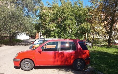 Toyota Raum I, 1999 год, 350 000 рублей, 22 фотография