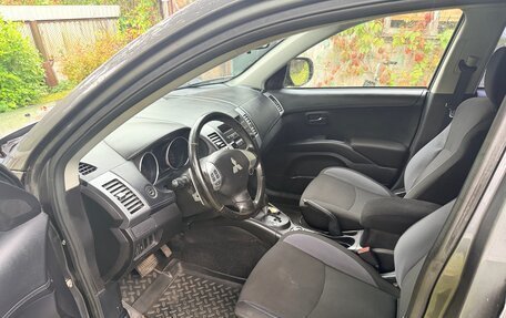 Mitsubishi Outlander III рестайлинг 3, 2011 год, 1 300 000 рублей, 11 фотография