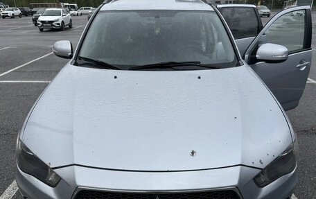 Mitsubishi Outlander III рестайлинг 3, 2011 год, 950 000 рублей, 24 фотография