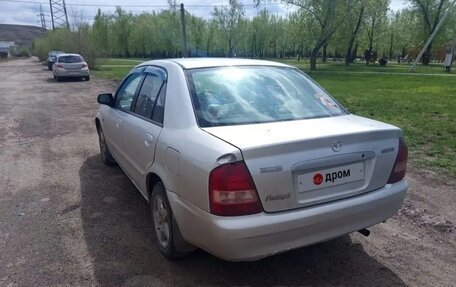 Mazda 323, 2003 год, 260 000 рублей, 10 фотография