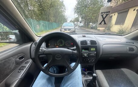Mazda 323, 1998 год, 115 000 рублей, 5 фотография