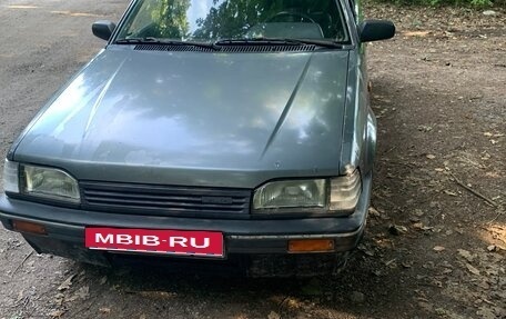 Mazda 323, 1987 год, 100 000 рублей, 1 фотография