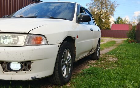 Mitsubishi Mirage VI рестайлинг, 2000 год, 190 000 рублей, 4 фотография
