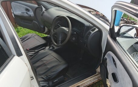 Mitsubishi Mirage VI рестайлинг, 2000 год, 190 000 рублей, 14 фотография