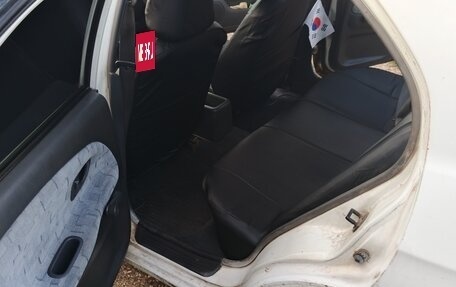 Mitsubishi Mirage VI рестайлинг, 2000 год, 190 000 рублей, 13 фотография