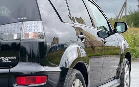 Mitsubishi Outlander III рестайлинг 3, 2011 год, 1 249 000 рублей, 10 фотография