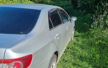 Toyota Corolla, 2011 год, 900 000 рублей, 4 фотография