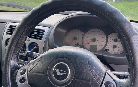 Daihatsu Storia, 2003 год, 320 000 рублей, 7 фотография