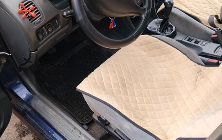 Mitsubishi Carisma I, 1997 год, 140 000 рублей, 12 фотография