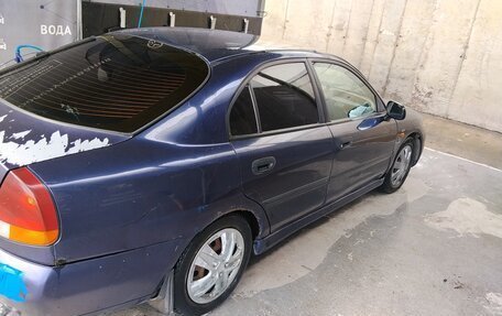 Mitsubishi Carisma I, 1997 год, 140 000 рублей, 14 фотография