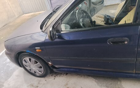 Mitsubishi Carisma I, 1997 год, 140 000 рублей, 19 фотография