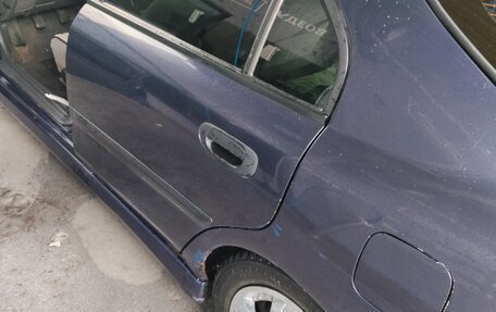 Mitsubishi Carisma I, 1997 год, 140 000 рублей, 21 фотография