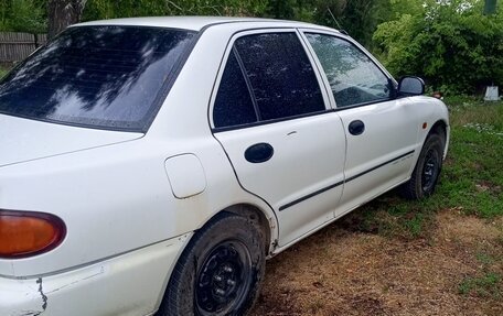 Mitsubishi Lancer VII, 1993 год, 100 000 рублей, 10 фотография