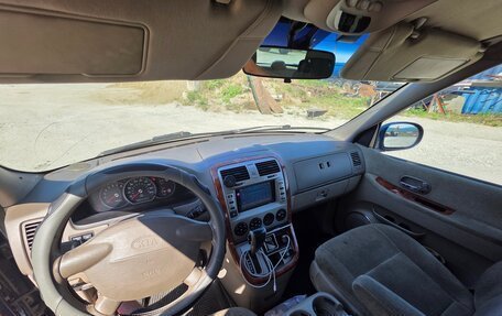 KIA Carnival III, 2004 год, 450 000 рублей, 11 фотография