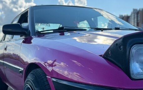 Mazda 323, 1992 год, 400 000 рублей, 11 фотография
