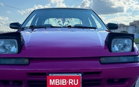 Mazda 323, 1992 год, 400 000 рублей, 10 фотография