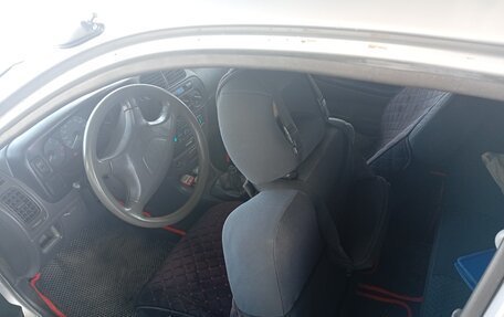 Mitsubishi Colt VI рестайлинг, 2002 год, 130 000 рублей, 5 фотография