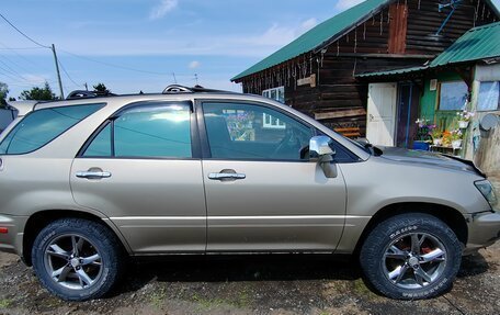 Lexus RX IV рестайлинг, 1999 год, 900 000 рублей, 8 фотография